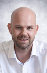 Portrait photo of Benjamin Fetsch, Director Global Communications at Freudenberg Home and Cleaning Solutions