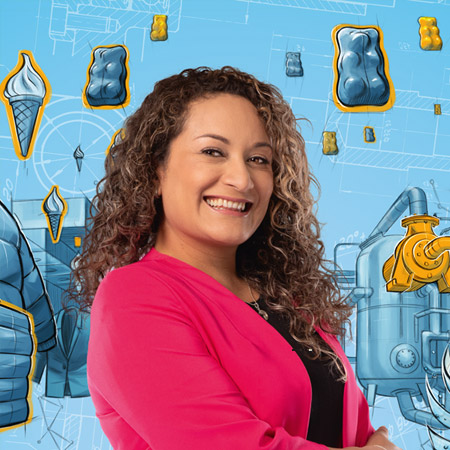 a smiling woman with curly brown hair in front of a light blue background with various scribbled items