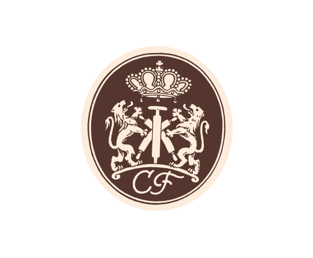 The picture is showing a round, brown symbol with a white emblem