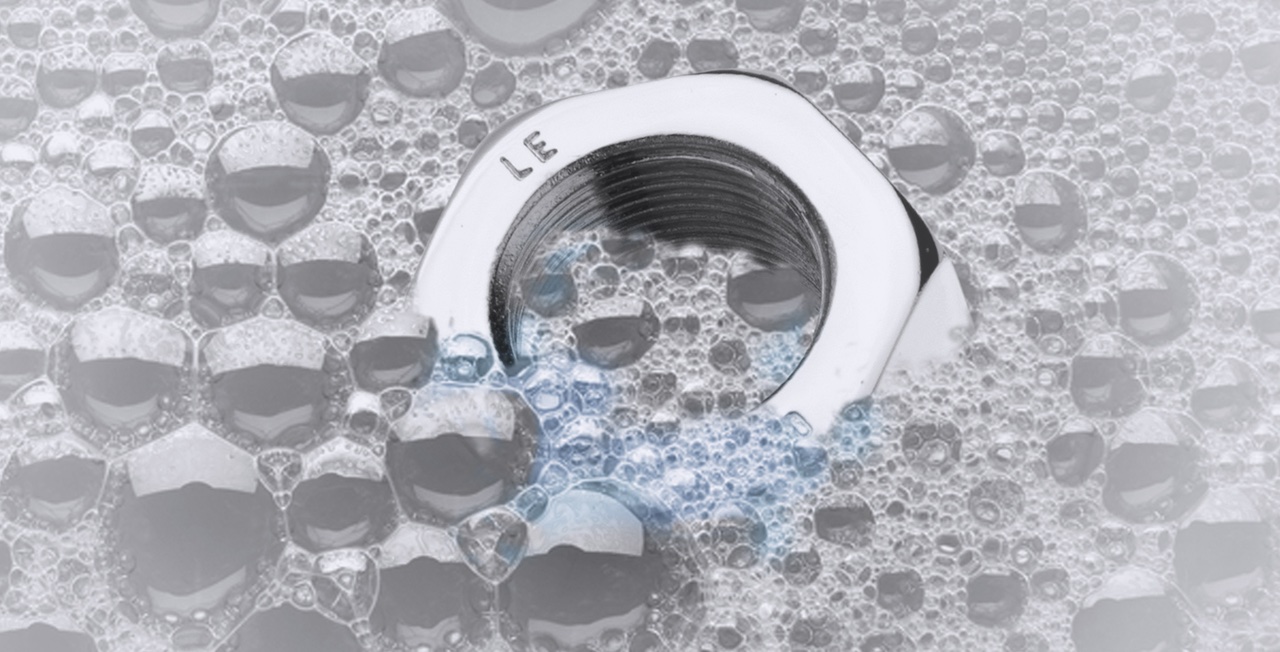 A metal round object being surrounded by bubbly water