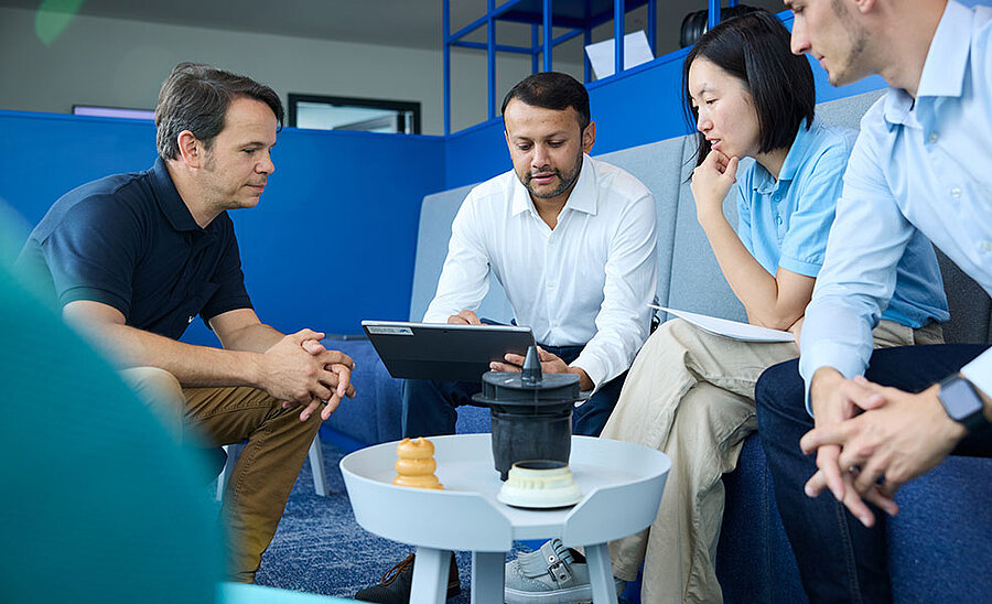 Group of people working together in a modern office environment
