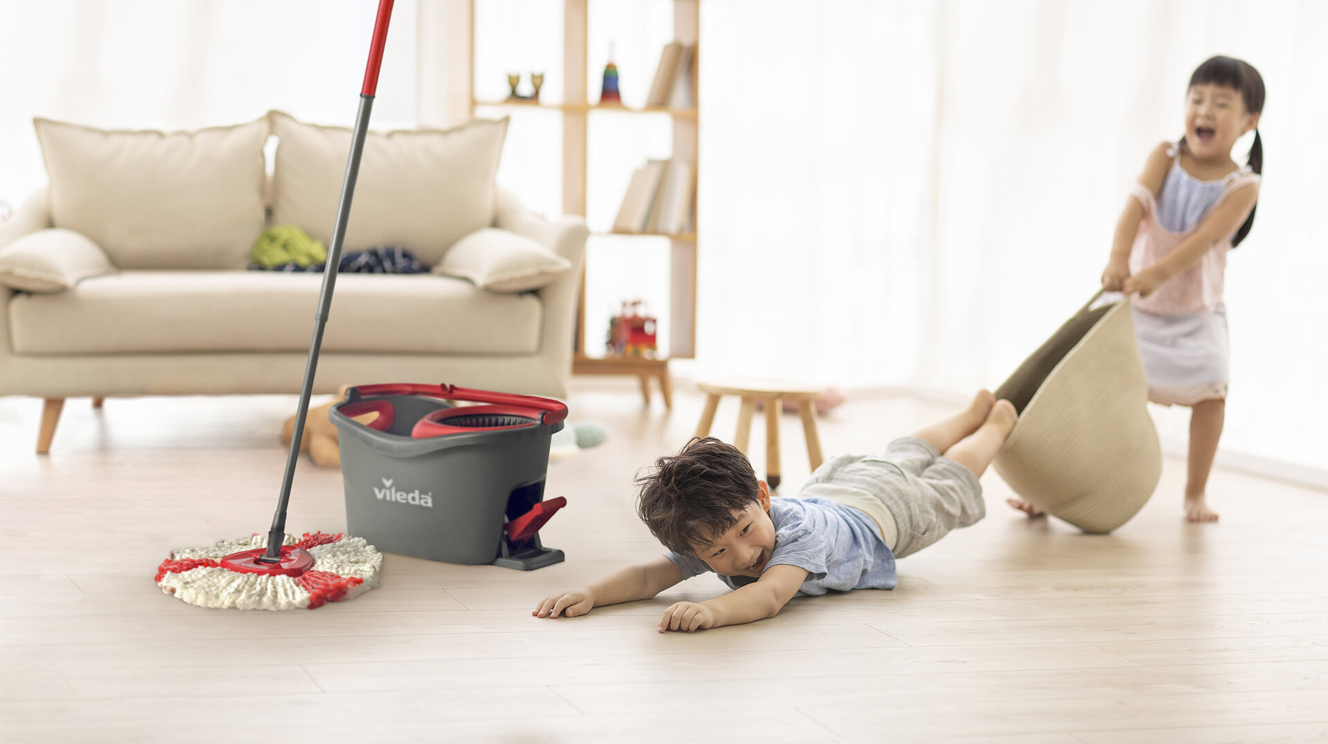 Cute Chinese children playing in living room