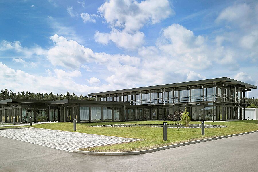 The picture shows a modern office building