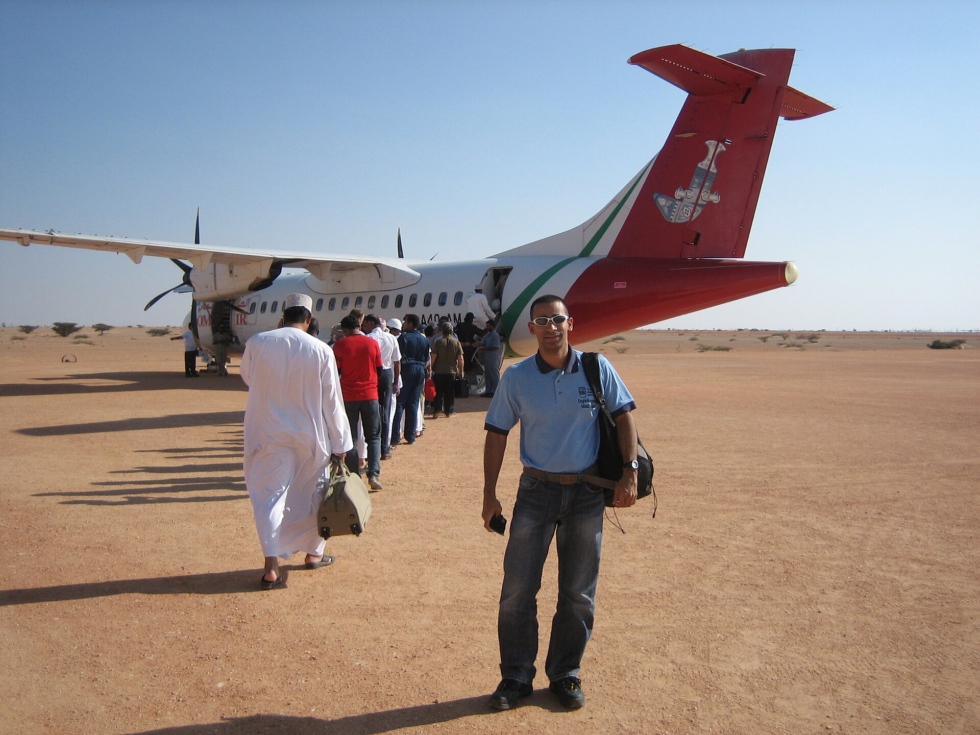 EagleBurgmann Project Development Manager Lorenzo Zabala in front of an airplane