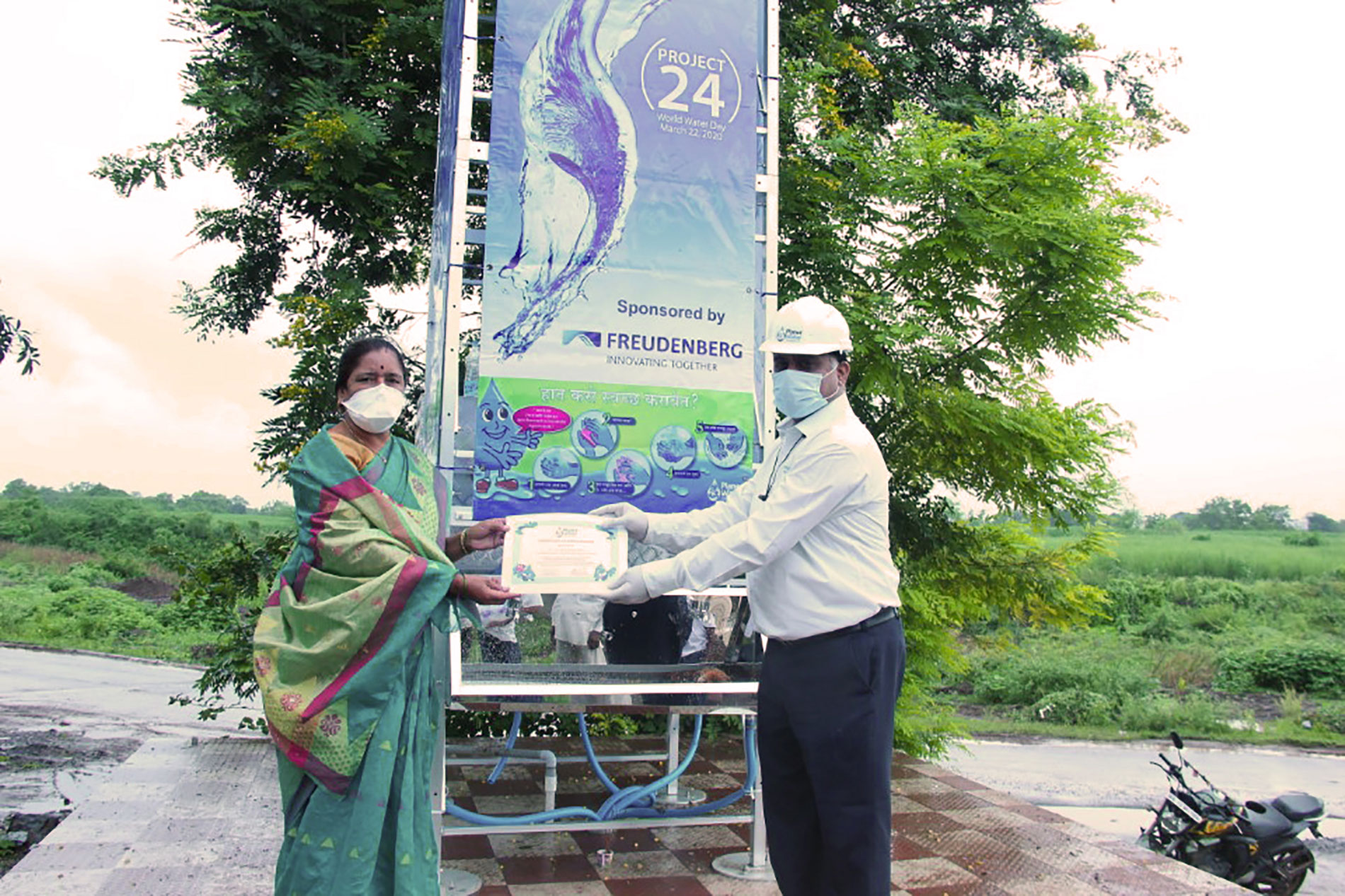 Man and woman in front of the Aqua Tower