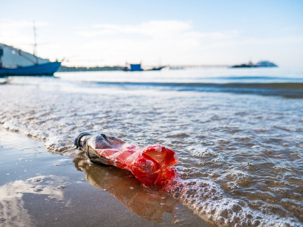 PET recycling PET bottle on the beach