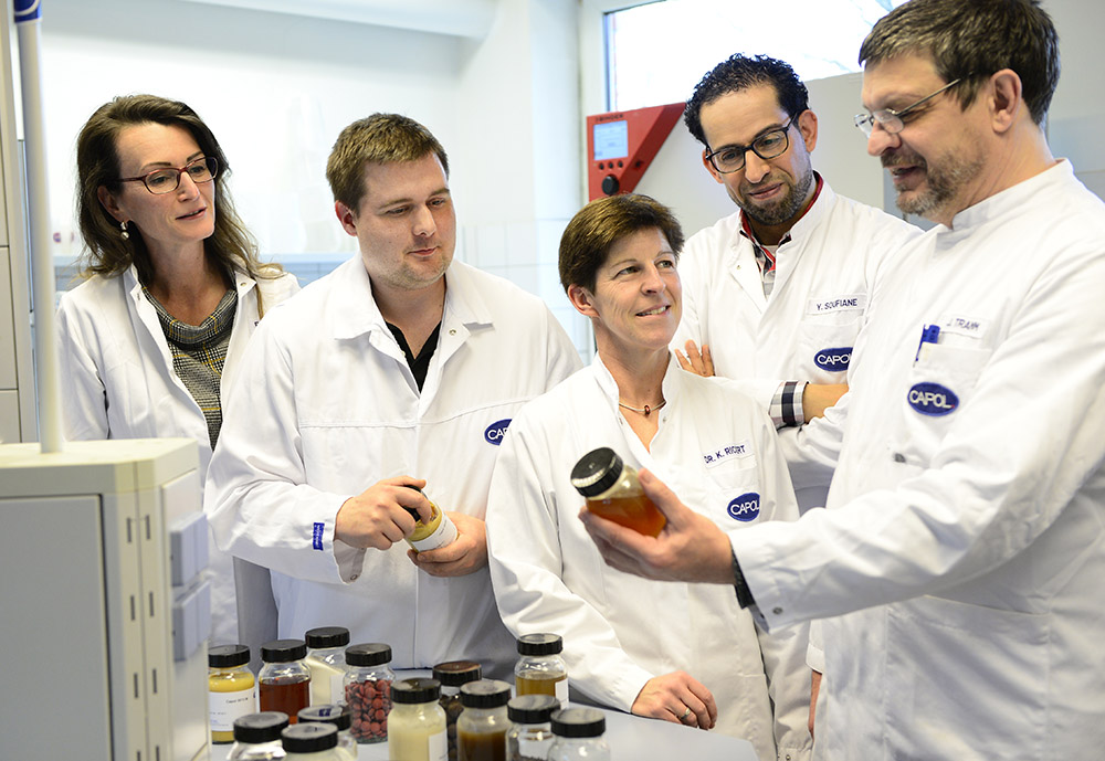 team of researchers in laboratory