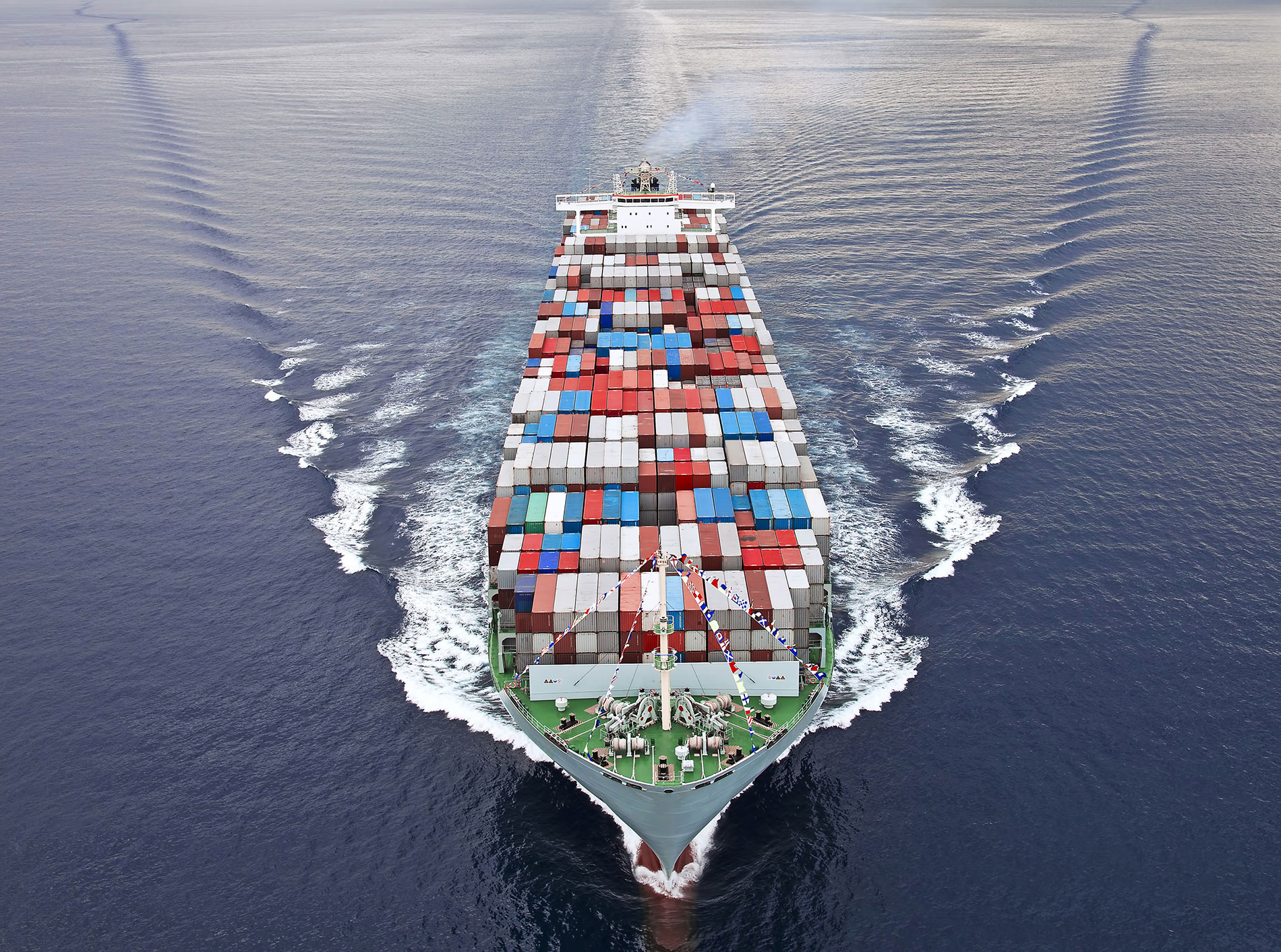 total view of container ship at sea